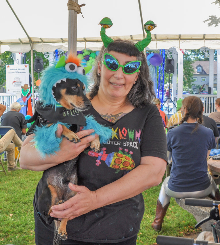 Dharma the Wonder Dog asked me why she doesn't have an alien costume like "Barnabas Collins," pictured here with his human at the Pine Bush UFO Fair a week or two ago. "Maybe for Halloween," I told her. "It's just around the corner."